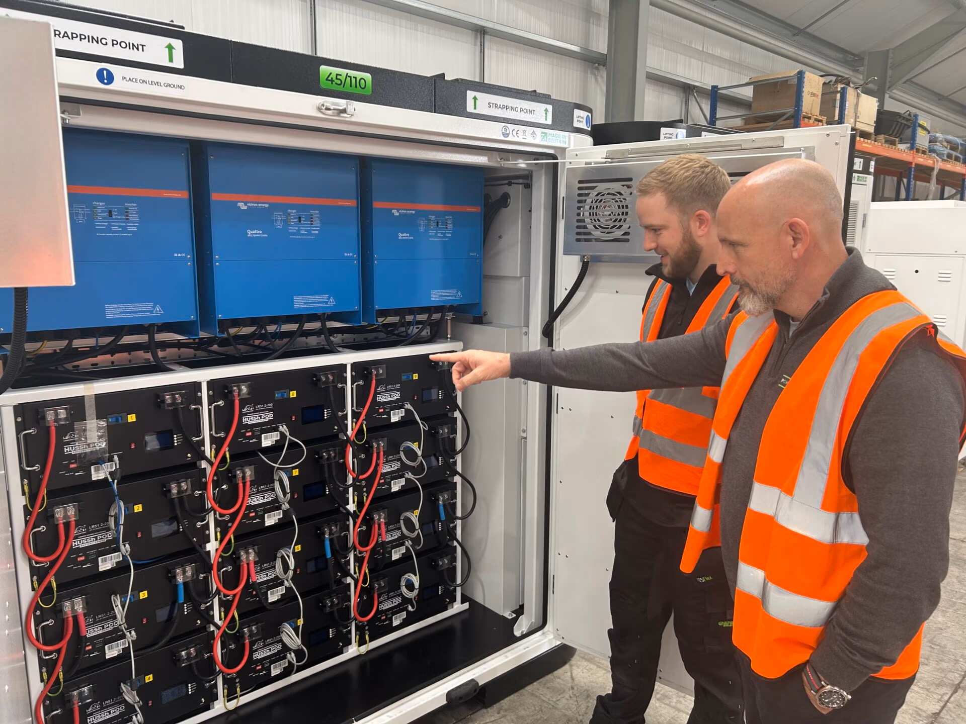 Andy Richardson showing Michael Egan inside a Hussh Pod